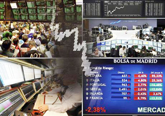 Nella foto la sala della Borsa con grafici e andamenti sugli schermi