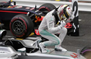 Mercedes driver Lewis Hamilton of Britain celebrates after winning the Formula One Grand Prix at the Monaco racetrack in Monaco, Sunday, May 29, 2016. (ANSA/AP Photo/Petr David Josek)
