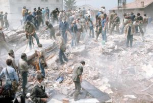 People outside their destroyed houses after a massive earthquake in Friuli region, Italy, 7 May 1976. ANSA/OLDPIX