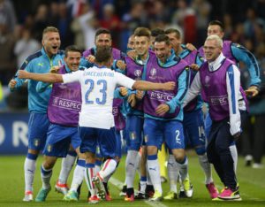 Emanuele Giaccherini (L) of Italy celebrates with teammates after scoring the 1-0 goal during the UEFA EURO 2016 group E preliminary round match between  Belgium and Italy at Stade de Lyon in Lyon, France, 13 June 2016.