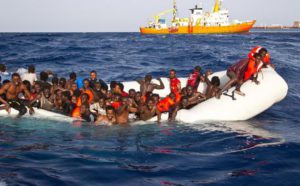 A handout photgraph made available by the Ong Sos Méditerranée showing migrants on a snking inflatable boat before being rescued by  the Aquarius ship of the humanitarian group SOS Mediterranee, and taken to  Lampesusa, Italy, 18 April 2016. EPA/ONG SOS MEDITERRANEE 