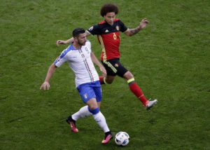 Graziano Pelle of Italy (L) and Axel Witsel of Belgium in action during the UEFA EURO 2016 group E preliminary round match between  Belgium and Italy at Stade de Lyon in Lyon, France, 13 June 2016. 