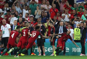Portugal's Ricardo Quaresma, right, celebrates after scoring the winning penalty during a penalty shootout at the end of the Euro 2016 quarterfinal soccer match between Poland and Portugal, at the Velodrome stadium in Marseille, France, Thursday, June 30, 2016. (ANSA/AP Photo/Thanassis Stavrakis)