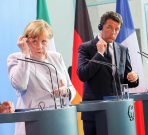 German Chancellor Angela Merkel (C) speaking alongside French President Francois Hollande (L) and Italian Prime Minister Matteo Renzi at a press conference, after meetings in the wake of Britain's referendum vote to leave the EU, in Berlin, Germany, 27 June 2016.  EPA/KAY NIETFELD