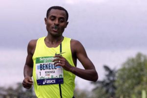Ethiopian runner Bekele Kenenisa competes on his way to win the Paris Marathon 2014 in Paris, France, 06 April 2014. EPA/ETIENNE LAURENT