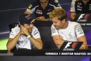  German Formula One driver Nico Rosberg (R) of Mercedes AMG GP and Brazilian Formula One driver Felipe Massa of Williams (L) have a chat during the press conference at the Hungaroring racetrack in Mogyorod near Budapest, Hungary, 21 July 2016. EPA/JANOS MARJAI HUNGARY OUT