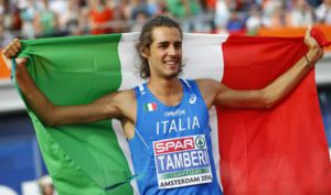 Italy's Gianmarco Tamberi celebrates after winning the gold medal in the men's high jump during the European Athletics Championships in Amsterdam, the Netherlands, Sunday, July 10, 2016. (ANSA/AP Photo/Matthias Schrader)