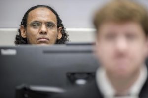 Ahmad Al Faqi Al Mahdi appears at the International Criminal Court in The Hague, Netherlands, Monday, Aug. 22, 2016, at the start of his trial on charges of involvement in the destruction of historic mausoleums in the Malian desert city of Timbuktu. (ANSA/AP Photo/Patrick Post, Pool) 