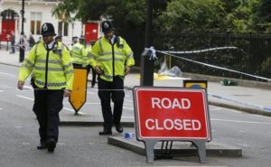 Police guard the scene of a knife attack near Russell Square in London, Thursday, Aug. 4, 2016. Terrorism is being examined as a potential motive for a knife rampage at Russell Square, central London, that left one woman dead and five others injured. (ANSA/AP Photo/Frank Augstein) [CopyrightNotice: Copyright 2016 The Associated Press. All rights reserved. This material may not be published, broadcast, rewritten or redistribu]