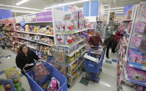 Shoppers browse items for sale in a Toys R Us store in Queensbury, New York, USA, 26 November 2015.  EPA/ANDREW GOMBERT