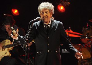 FILE  - In this Jan. 12, 2012, file photo, Bob Dylan performs in Los Angeles. Dylan was named the winner of the 2016 Nobel Prize in literature Thursday, Oct. 13, 2016, in a stunning announcement that for the first time bestowed the prestigious award to someone primarily seen as a musician. (ANSA/AP Photo/Chris Pizzello, File) 