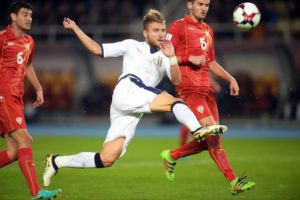 Ciro Immobile (C) of Italy in action against Macedonian players Daniel Mojsov (R) and Vance Sikov (L) during the FIFA World Cup 2018 qualification match between Macedonia and Italy at the Filip II Arena in Skopje, The Former Yugoslav Republic of Macedonia, 09 October 2016.  EPA/GEORGI LICOVSKI