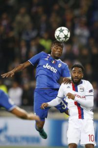 Patrice Evra (L) of Juventus Turin vies for the ball with Alexandre Lacazette (R) of Olympique Lyon during the UEFA Champions League group H soccer match between Olympique Lyon and Juventus Turin at Parc Olympique Lyonnais in Decines, near Lyon, France, 18 October 2016.  EPA/GUILLAUME HORCAJUELO
