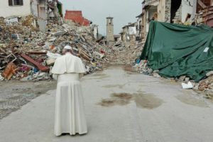 Pope Francis praying infront the ruins in Amatrice, Italy, 04 October 2016 as he arrives to meet people who survived the earthquake hit town of Amatrice. A devastating 6.0 magnitude earthquake early morning of 24 August left a total of 293 dead, according to official sources.  ANSA/MATTEO GUIDELLI