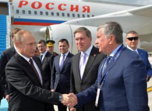 Russian President Vladimir Putin (L) shakes hands with head of Russia's top oil producer Rosneft, Igor Sechin (R) as he arrives at Ataturk airport in Istambul, Turkey. Putin is in Turkey to attend the 23rd World Energy Congress and during his visit he is expected to meet with Turkish President Recep Tayyip Erdogan to discuss possible energy and tade agreements.  EPA/ALEXEY DRUZHINYN /SPUTNIK/KREMLIN POOL