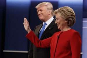 Republican presidential candidate Donald Trump, left, stands with Democratic presidential candidate Hillary Clinton before the first presidential debate at Hofstra University, Monday, Sept. 26, 2016, in Hempstead, N.Y. (ANSA/AP Photo/ Evan Vucci)