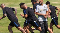 Spalletti e un gruppo di giocatori Inter