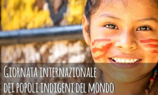 Il poster della Giornata internazionale degli indigeni, con il viso sorridente di una fanciulla
