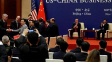 Quando si firmavano accordi commerciali tra Usa e Cina a Pechina con Trump e Xi seduti in lontananza.