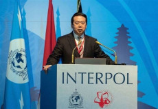 Meng Hongwei, in un intervento dal podio dell'Interpol