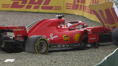 La Ferrari di Vettel fuori pista durante il GP di Germania