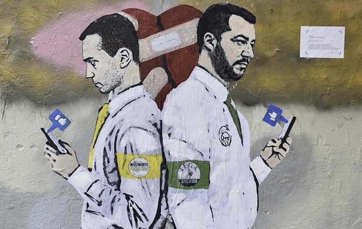 Un graffiti apparso nei giorni scorsi con Di Maio e Salvini opposti. Imprese