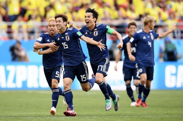 Giocatori della nazionale del Giappone festeggiano il gol. Samurai