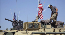 Soldati americani sui mezzi blindati in Siria