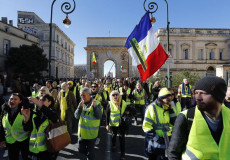 Una dimostrazione di protesta dei gilet gialli a Parigi. Ambasciatore
