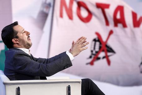 Matteo Salvini, vice premier e ministro dell'Interno, durante la trasmissione televisiva 'Porta a Porta' in onda su Rai Uno di fronte ad un manifesto con la scritta "No Tav"