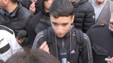 Un femo immagine tratto da un video mostra il ragazzo di 15 anni che ha preso la parole durante la manifestazione di Casapound a Torre Maura, quartiere alla periferia di Roma da giorni al centro delle polemiche per l'arrivo di alcuni nomadi in un centro della zona.