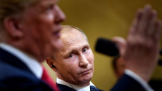 Vladimir Putin e Donald Trump al G20, sguardi in cagnesco.