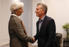L'ex presidente argentino Mauricio Macri e l'ex direttrice del Fmi, Christine Lagarde,durante la firma dell'accordo finanziario di luglio 2018. Immagine d'archivio