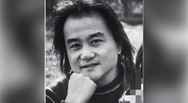 Una fotografia in bianco e nero del regsita cinese Chang Kai.