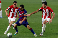 Leo Messi in azione contro l'Atletico Madrid.