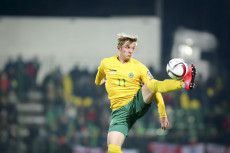 Arvydas Novikovas in azione con la maglia della nazionale della Lituania.