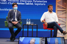 Il l ministro della Salute Roberto Speranza (S), il leader della Lega Matteo Salvini (D), al Meeting di Rimini,