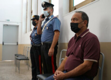 Domenico Lucano, ex sindaco di Riace, durante la lettura della sentenza con cui il Tribunale di Locri lo ha condannato a 13 anni e due mesi di reclusione a Locri