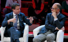 Il presidente del M5s Giuseppe Conte (S) e il segretario del Pd, Enrico Letta, durante l'evento della Cgil ''Il Lavoro interroga'', Roma,